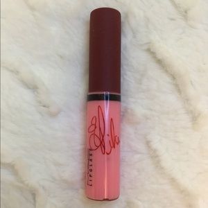 MAC “lipglass” Viva Glam Rihanna - shimmery pink